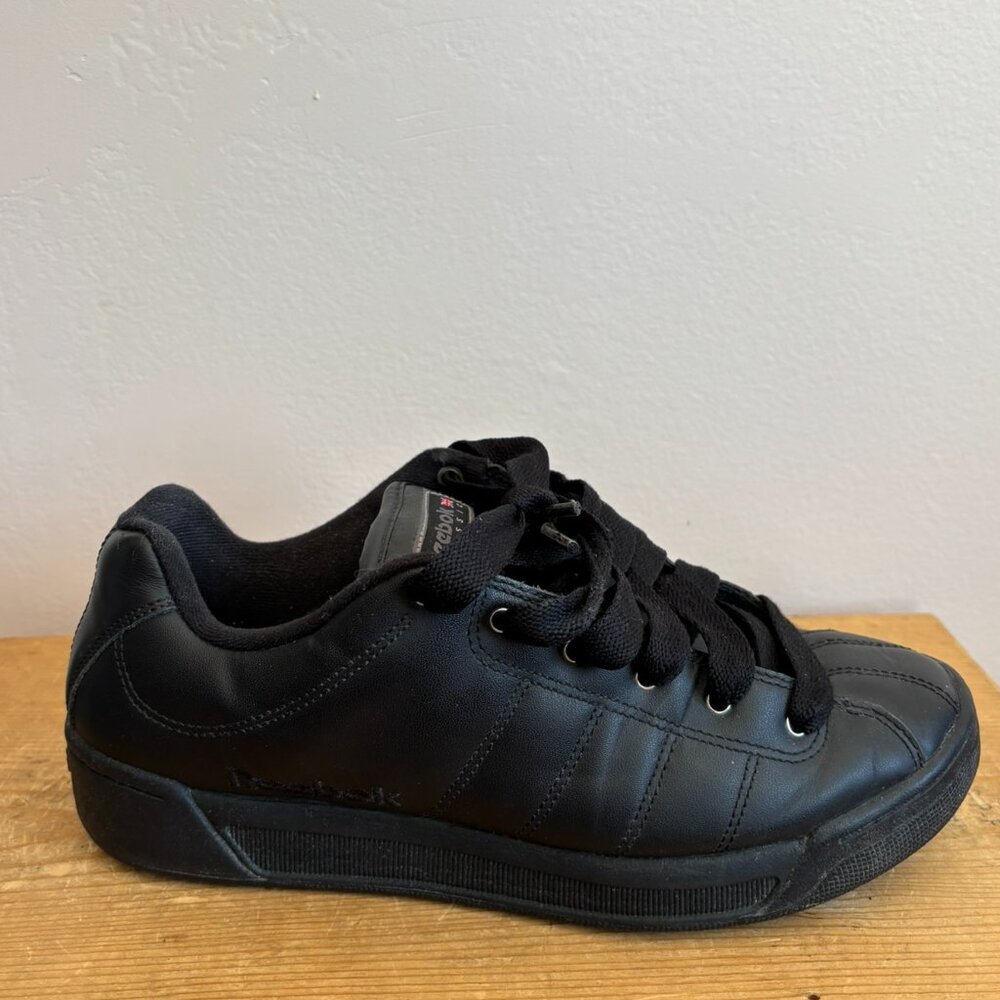 Black leather Reebok skater shoes
